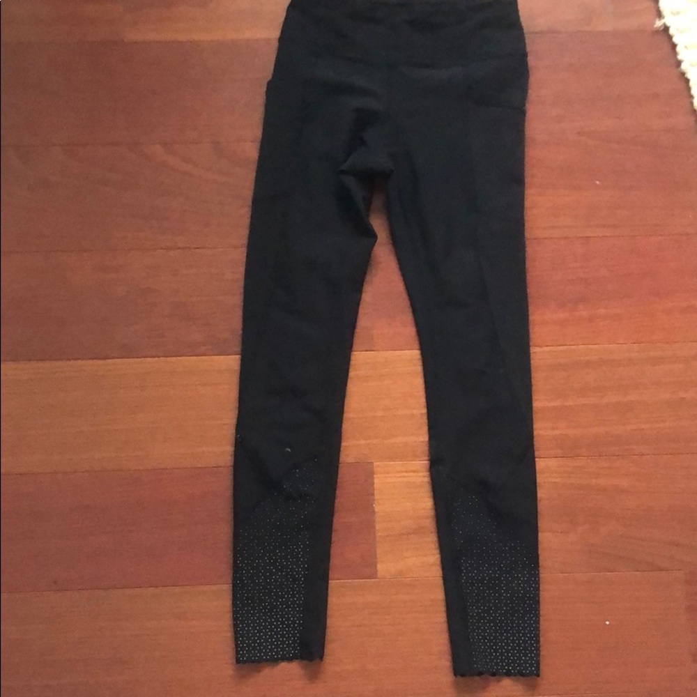 black lululemon leggings with design on the bottom